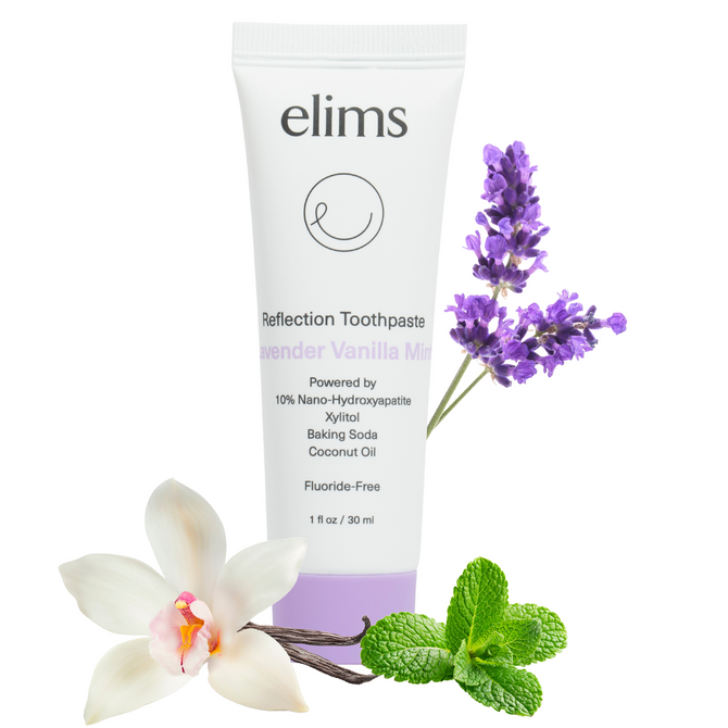 Elims Reflection Toothpaste tube with lavender, vanilla, and mint leaves on a white background