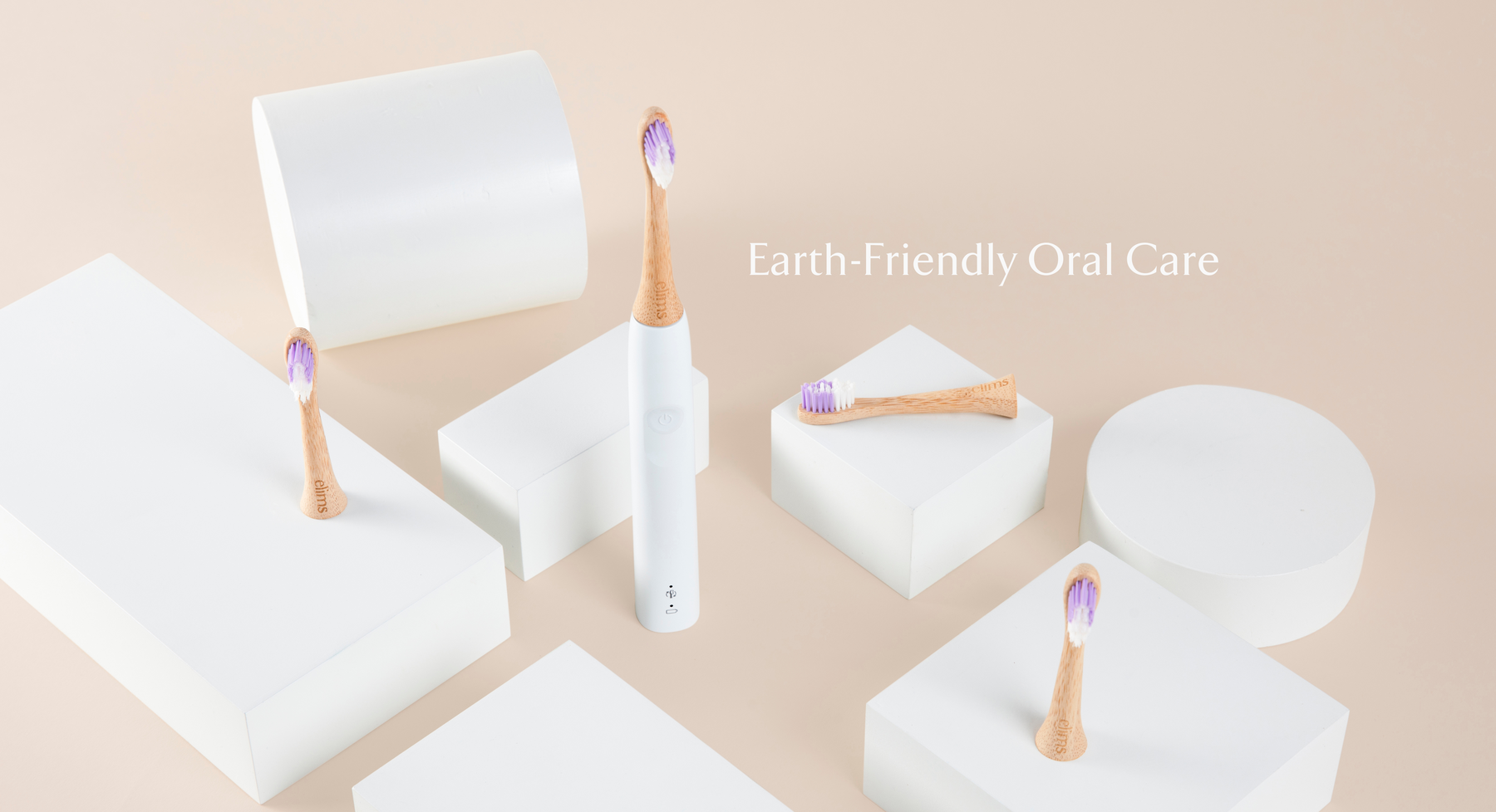 elims oral care's premium bamboo toothbrush heads shown on white blocks