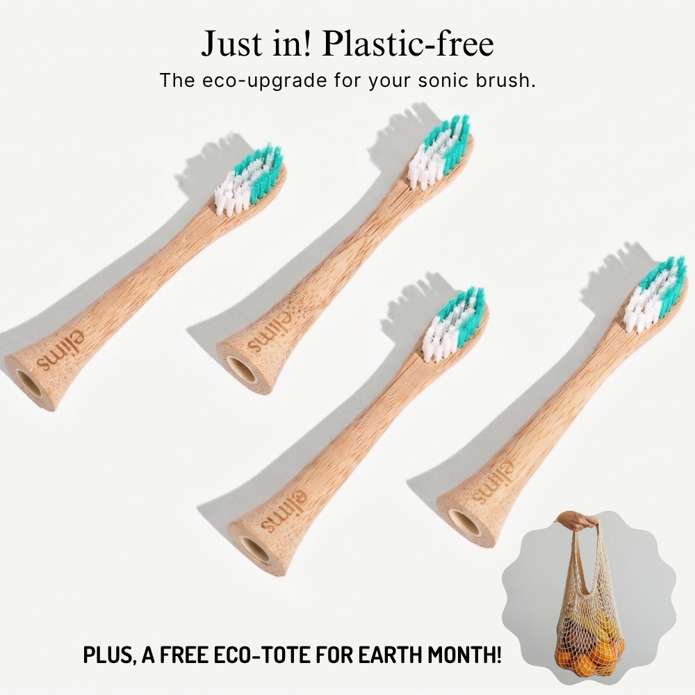 Set of four elims bamboo toothbrushes with teal bristles on a white background, accompanied by a free eco-tote offer.