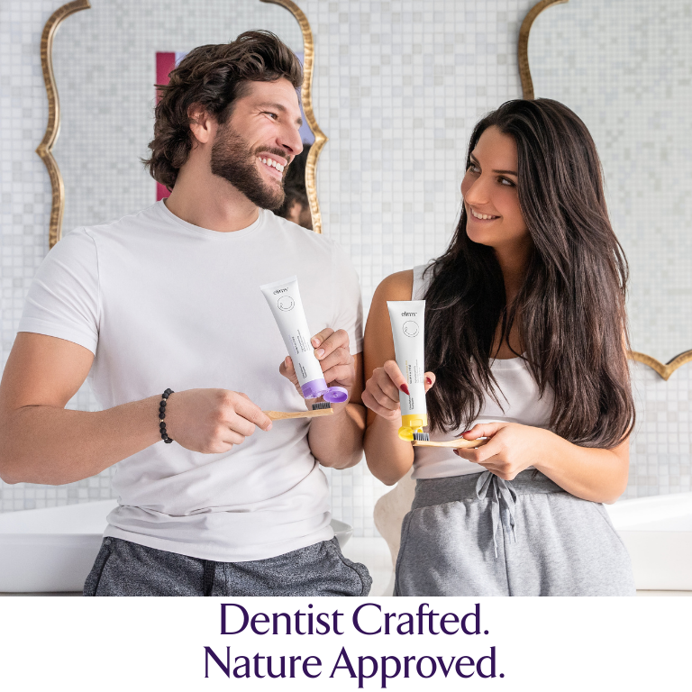 young man and woman brushing their teeth together with elims toothpastes