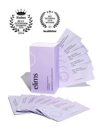 Elms teeth whitening packets with awards on a white background