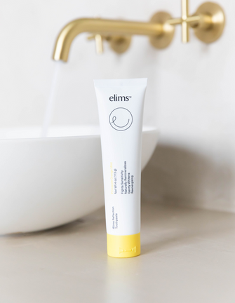 ELIMS Reflection fluoride-free toothpaste, Pineapple Orange Mint, 4oz tube in sustainable packaging
