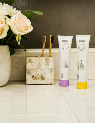 ELIMS Reflection 2-pack combo toothpaste in the flavors pineapple orange mint and lavender vanilla mint. Combines natural ingredients like nano-hydroxyapatite, a natural mineral and fluoride alternative, and xylitol. Formulated with input from dentists to gently remineralize teeth and keep your mouth fresh all day or night. Foodie friend approved!